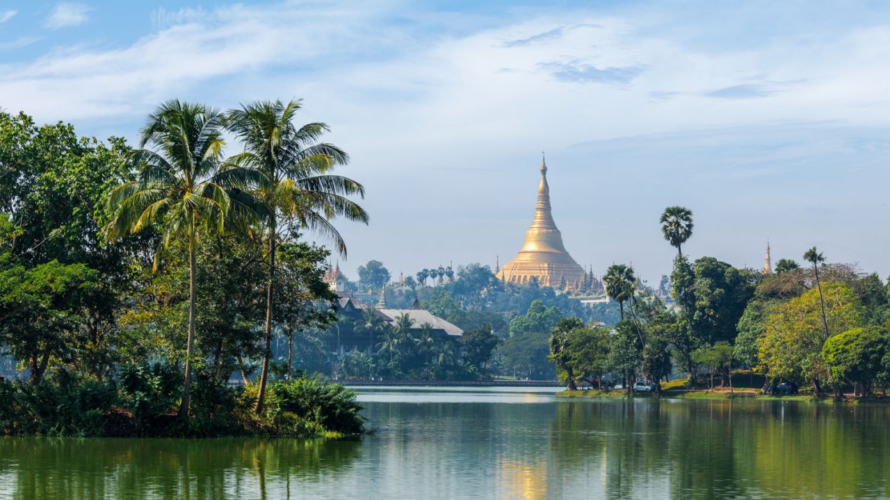 View of Kyaukhtatgyi Pagoda over Kandawgyi Lake, Yangon.