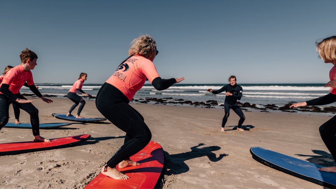 Students working on their surf stance at Inverloch beach - Offshore Surf School Inverloch