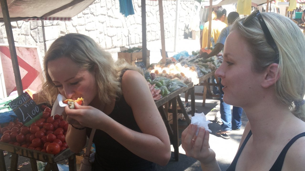 Fruit sampling at the farmers market