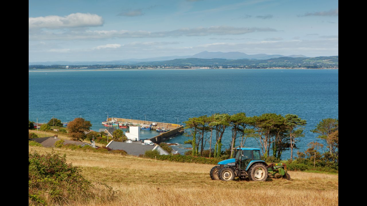 Relax and enjoy the views from Helvick Head accross Dungarvan Bay to the Comeragh Mountains