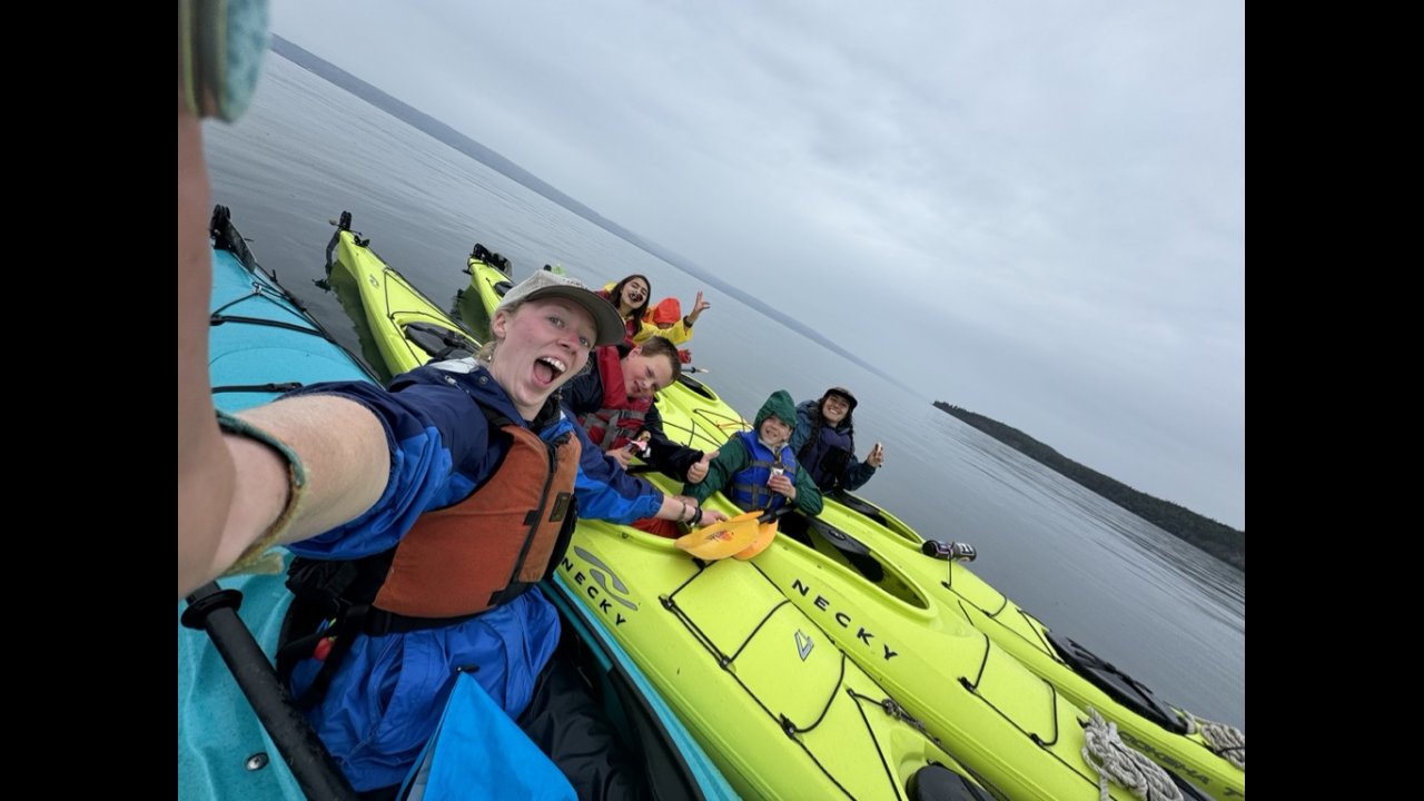 Staff help ferry campers to and from the dipnet site by kayak.