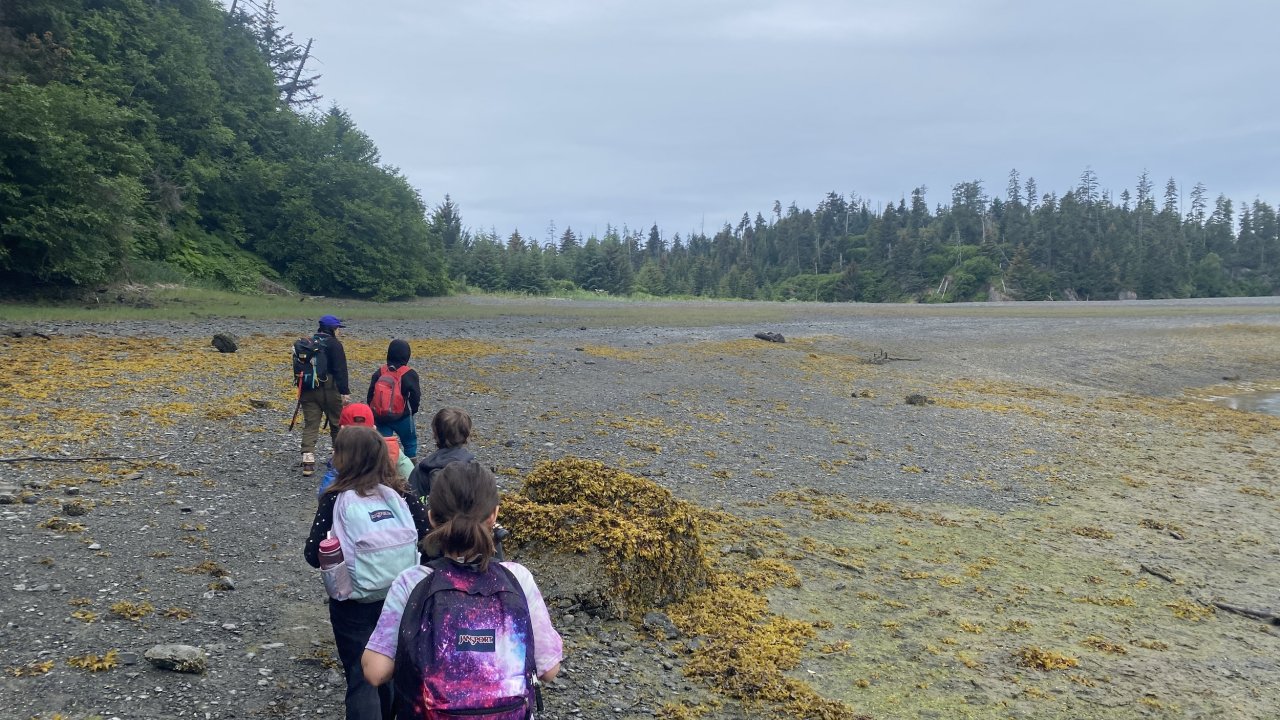 An educator guides campers at the Peterson Bay Field Station.