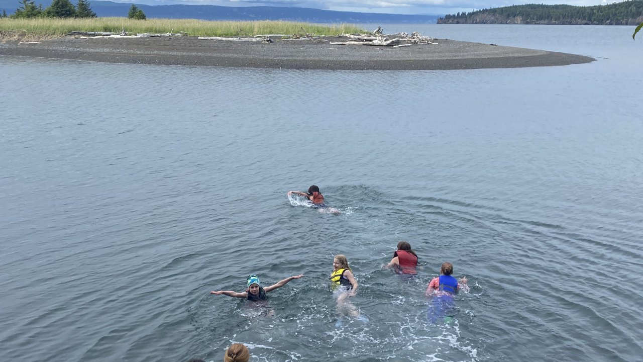 Campers swimming in the Peterson Lagoon