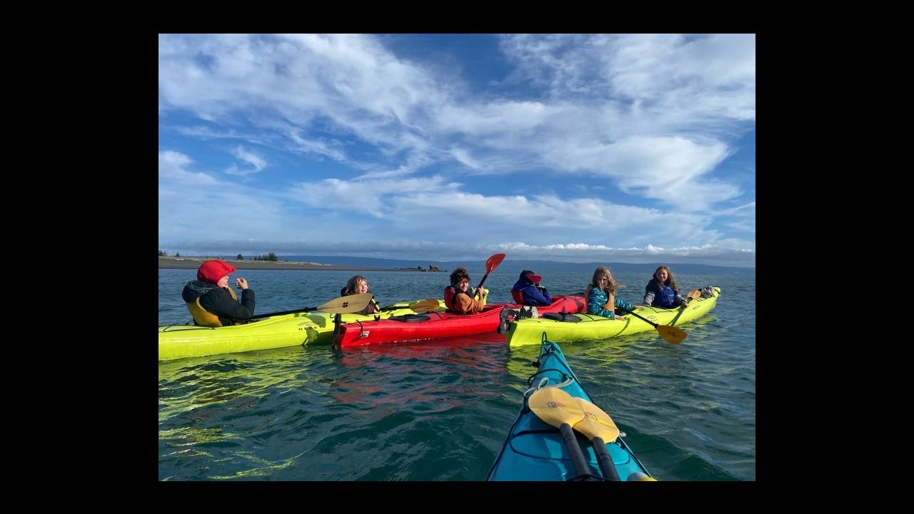 Campers enjoy kayaking in Peterson Bay.