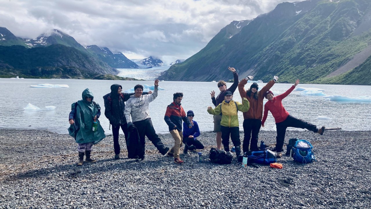Campers enjoying the scenery at Grewingk Glacier Lake.