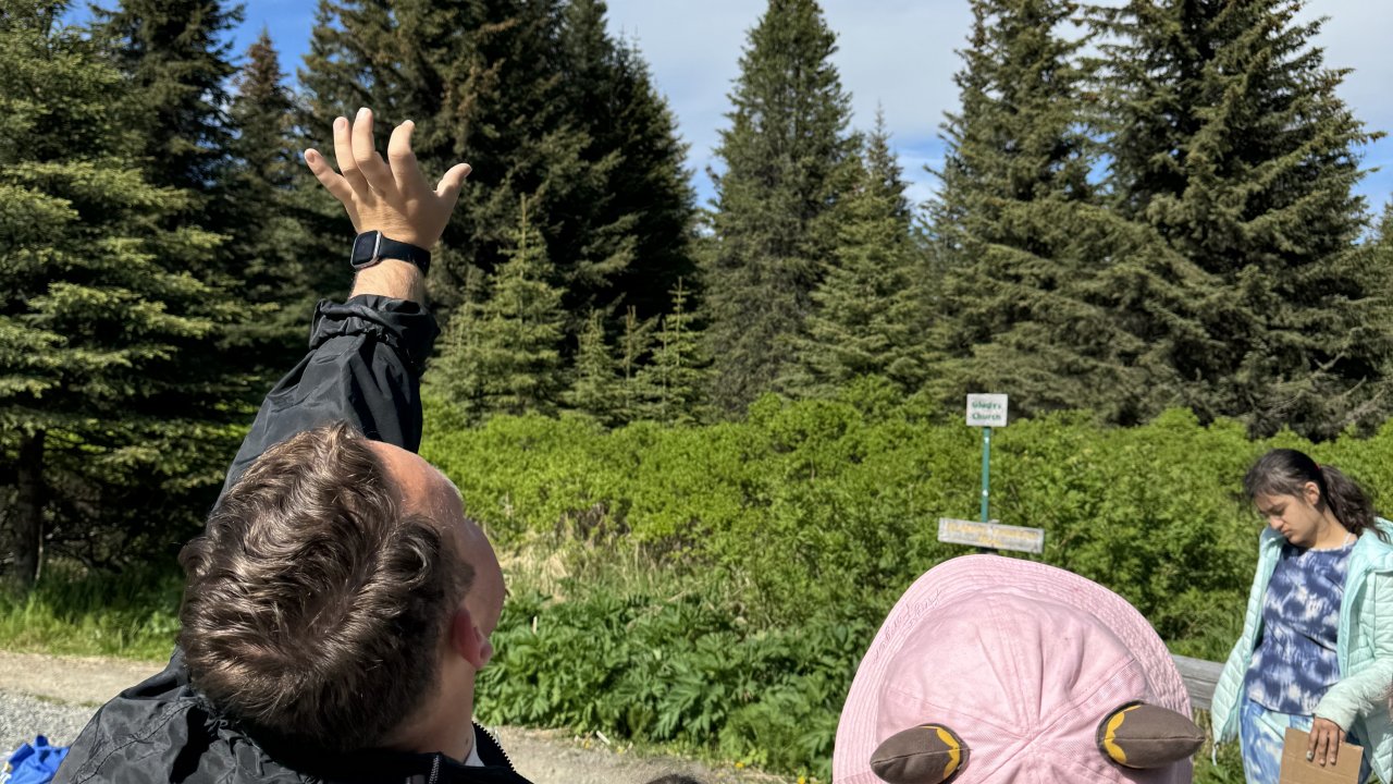 An educator gives a lesson about meteorology.