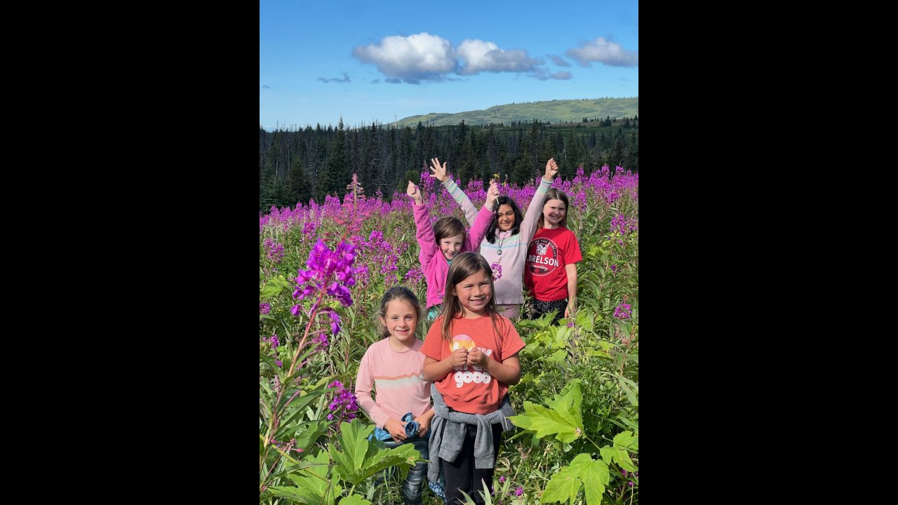 Campers enjoying the fireweed at Eveline State Park.