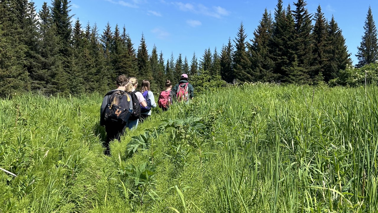 Campers on a hike through the Wynn Nature Center.