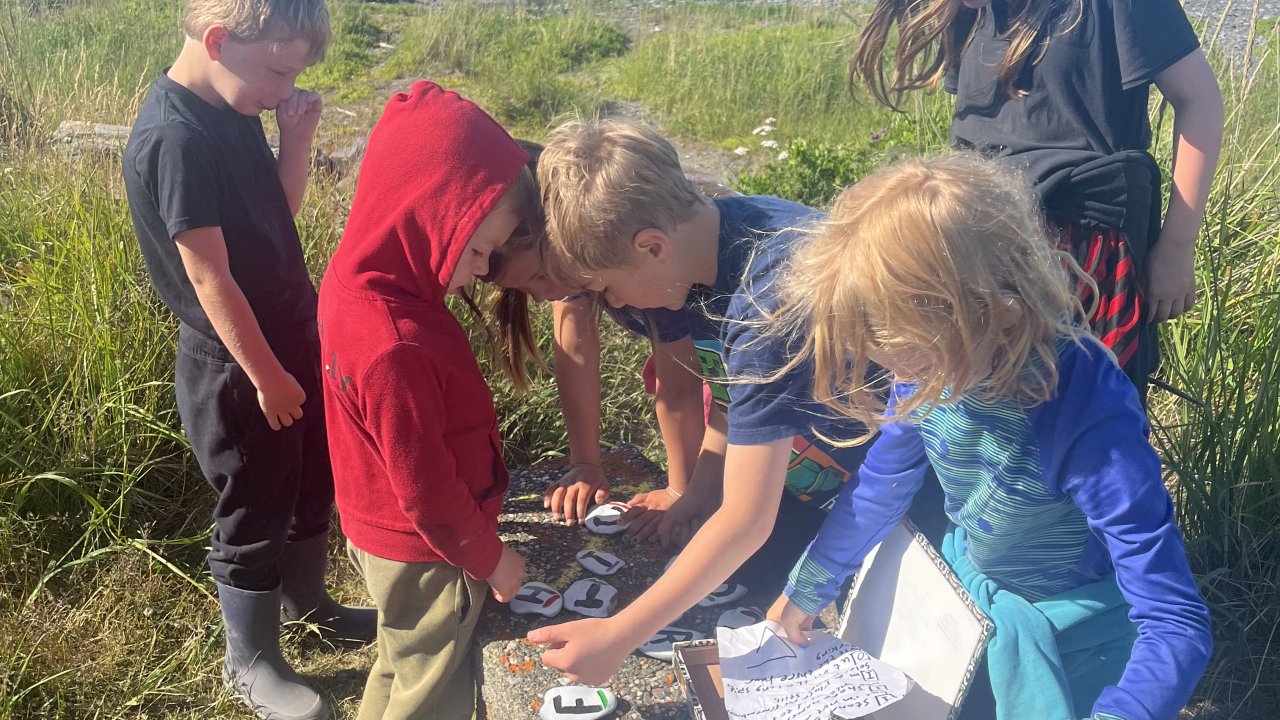 SPIT Kids solve a scavenger hunt activity.