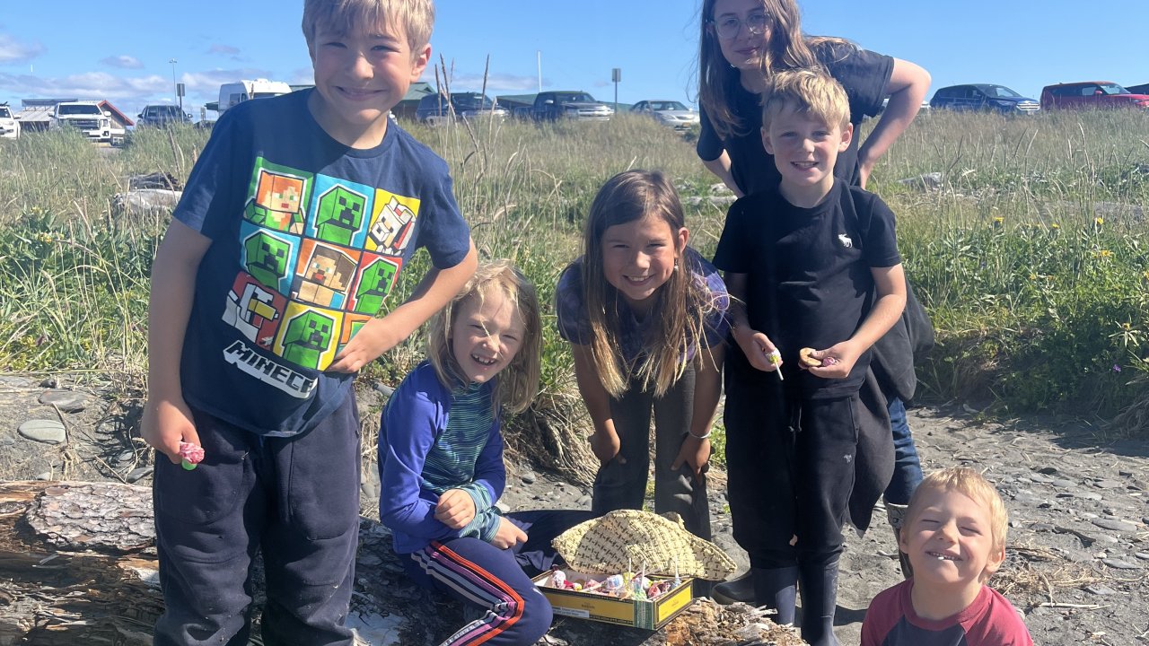 Campers enjoying a sunny beach.