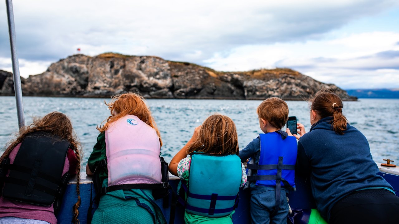Cruising by Gull Island. Photo by Wilder Arts Photography.