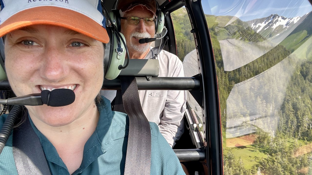 Two volunteers in the helicopter over Montague.