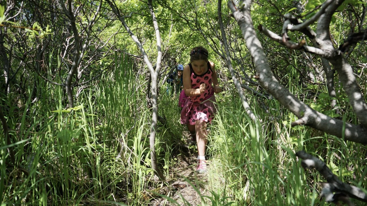 Child playing at the Wynn Nature Center trails