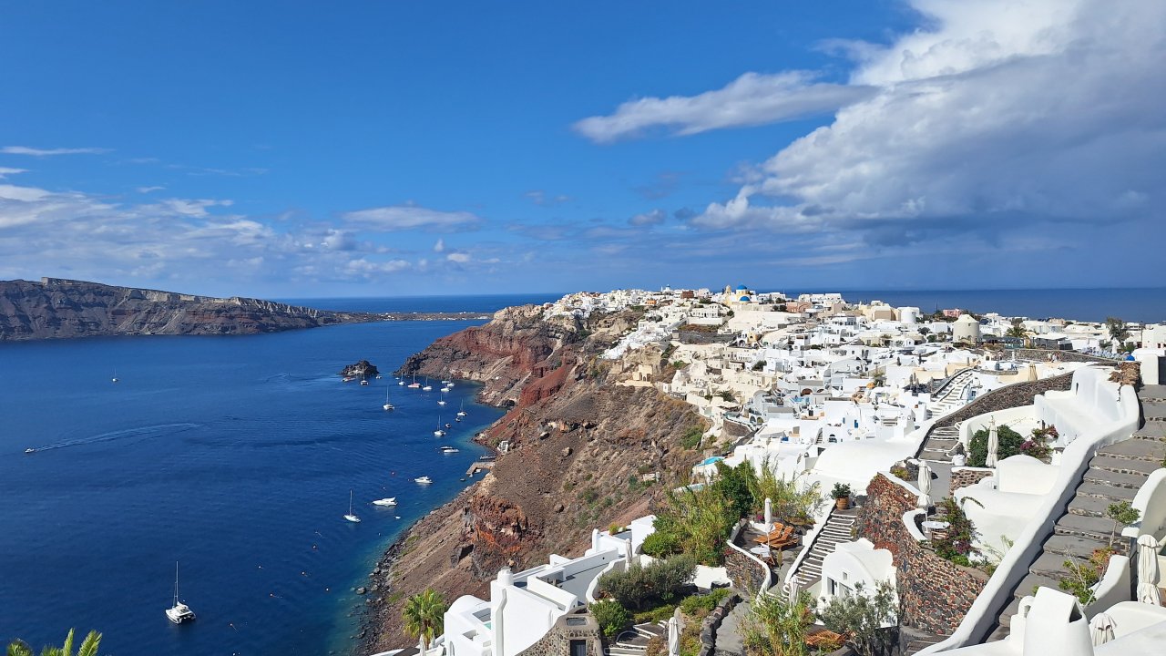 Oia village cliffside during 7-hour private Santorini tour, away from the crowds