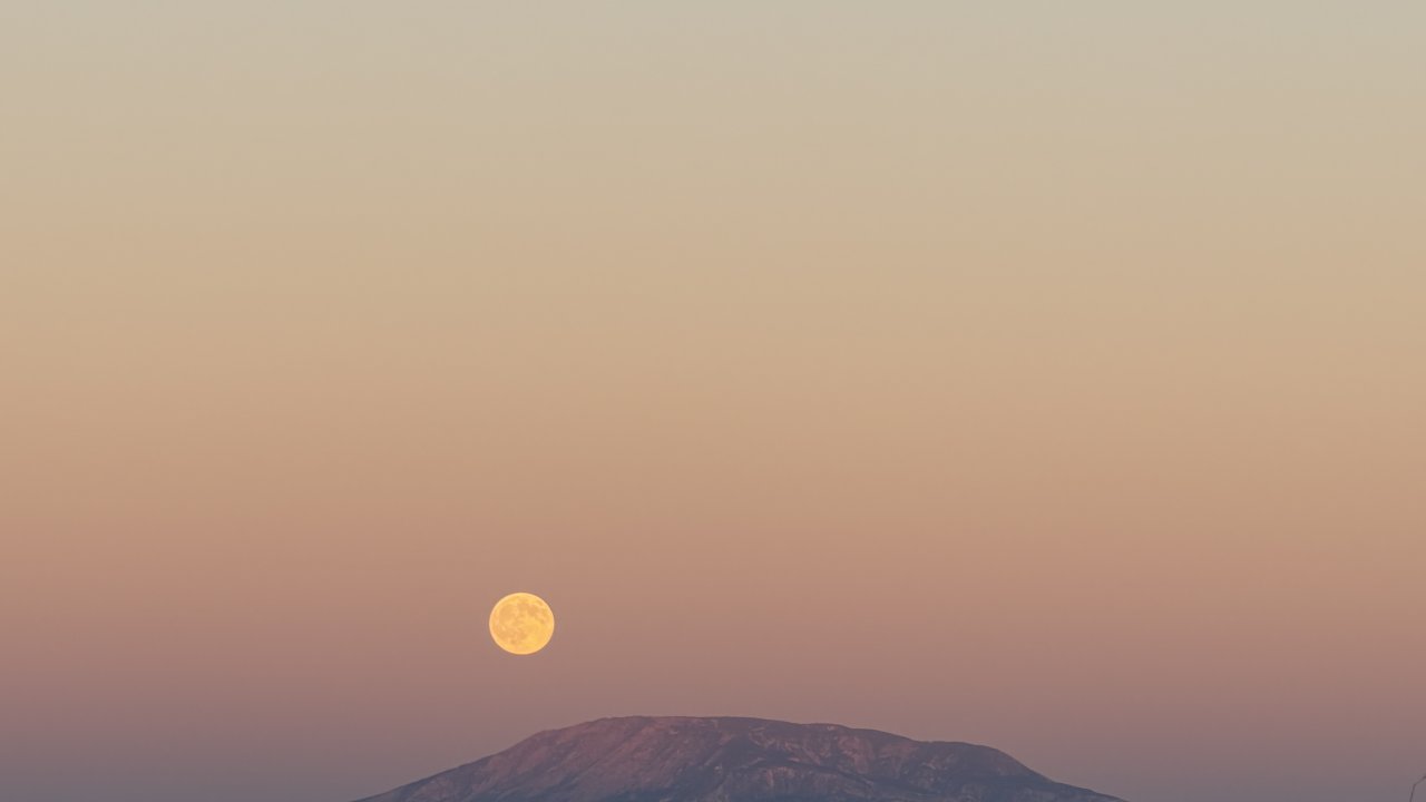 Moon rising over Navajo Mountain