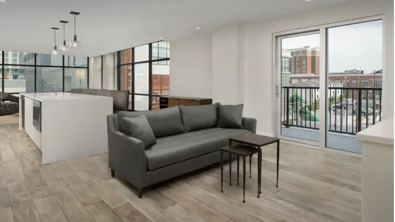 Presidential Condo Suite with 2 bedrooms, 2 baths, living room, kitchen, and private balcony.